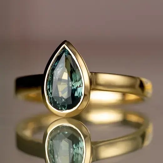 Wyatt_Jewellery_Pear-shape-teal-sapphire-yellow-gold-engagement-ring