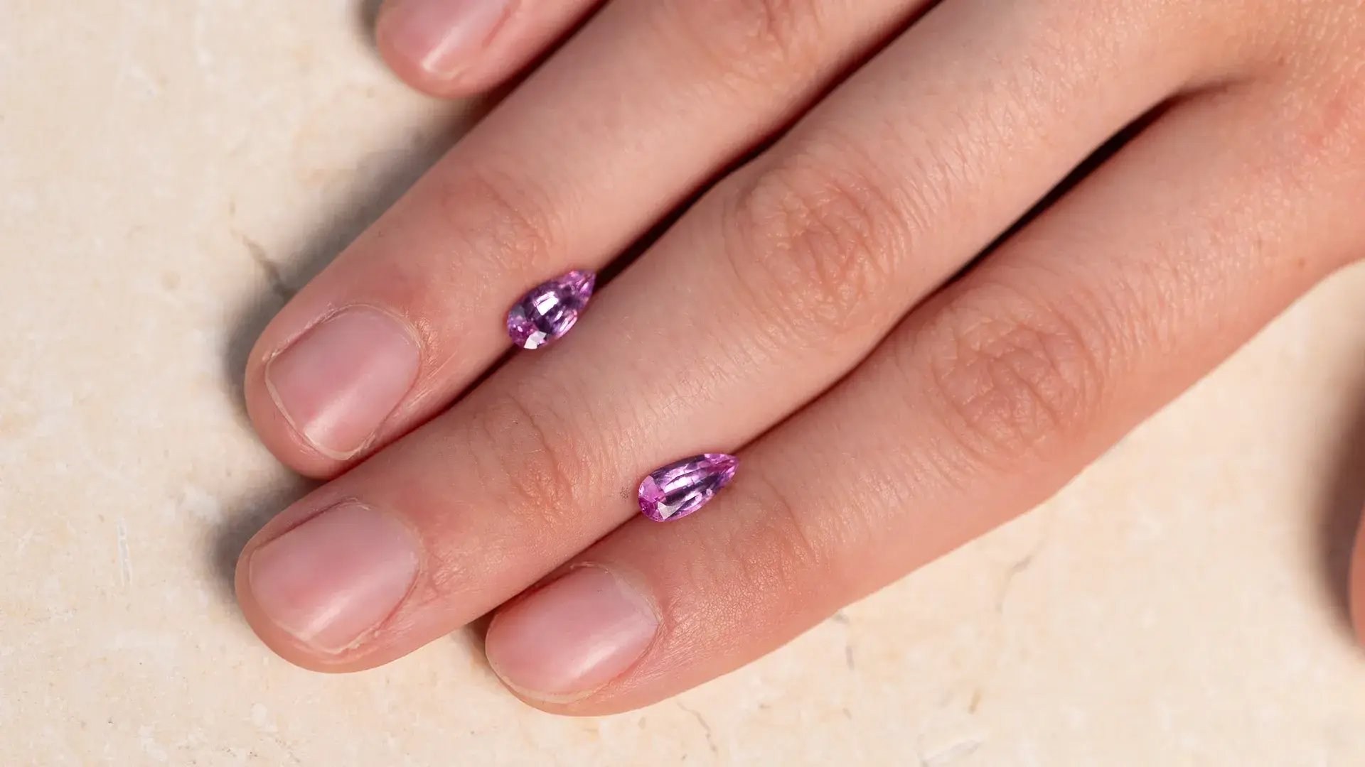 WJ_Pink_Sapphire_Pair_S031_Hand_Landscape