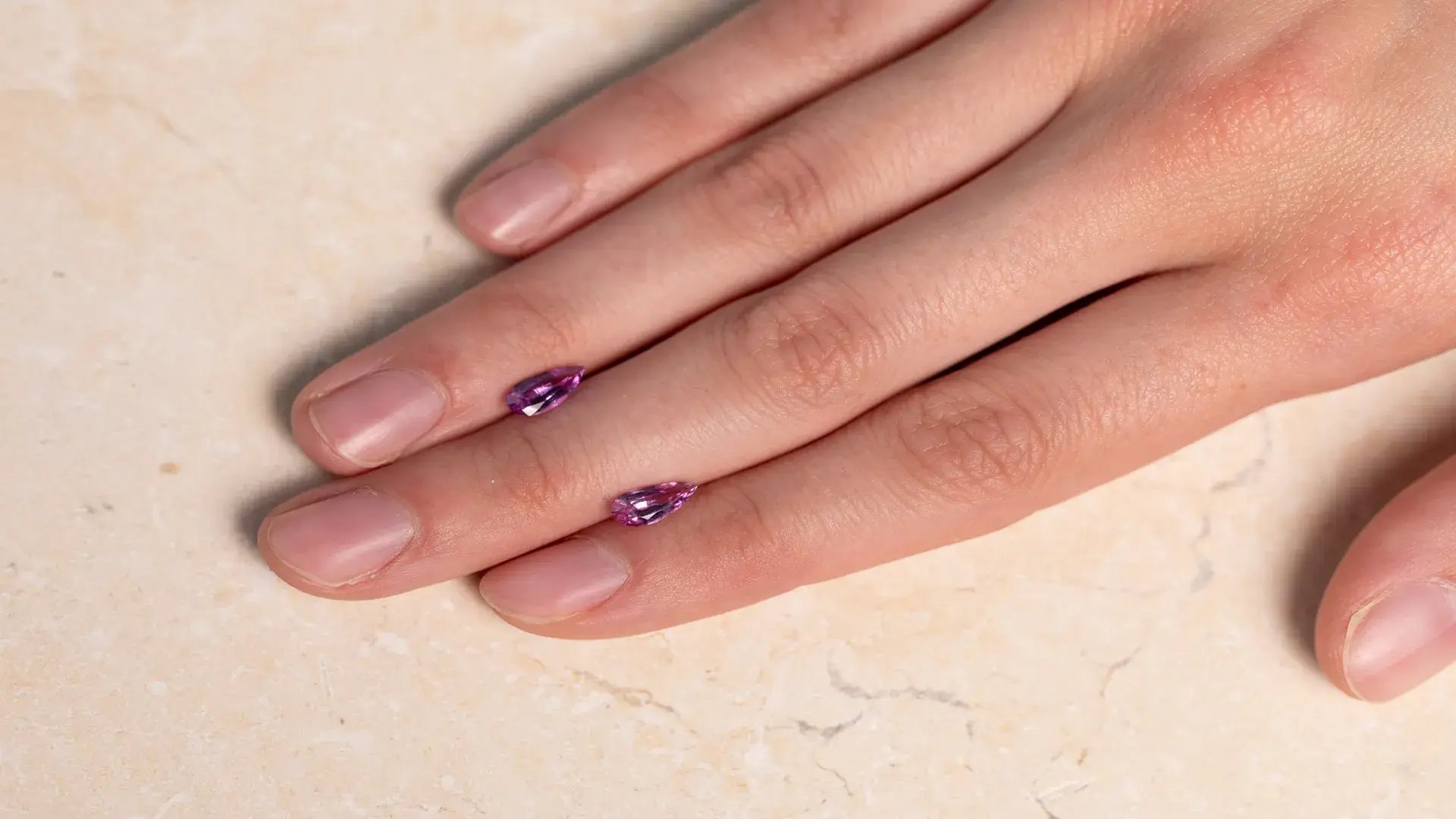 WJ_Purple_Sapphire_Pair_S029_Hand_Landscape