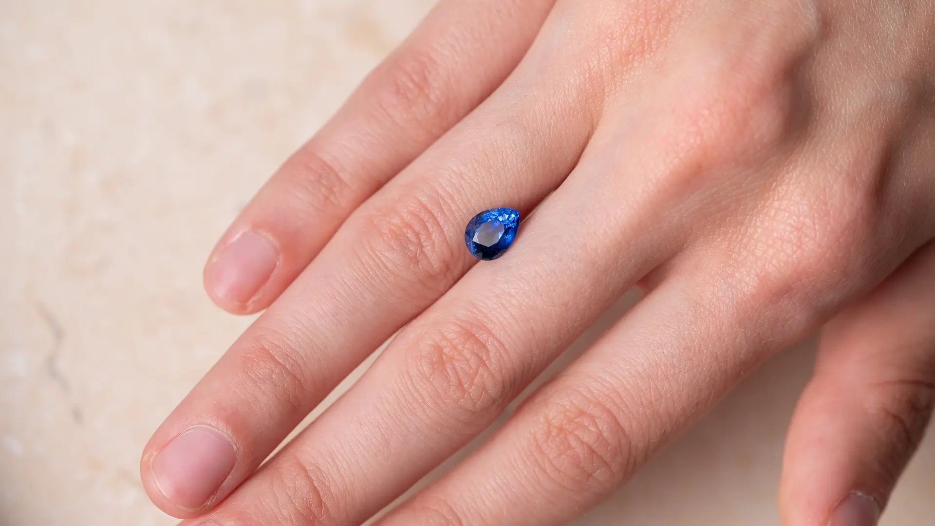 Wyatt-Jewellery-Sapphire-pear-shape-hand-S021